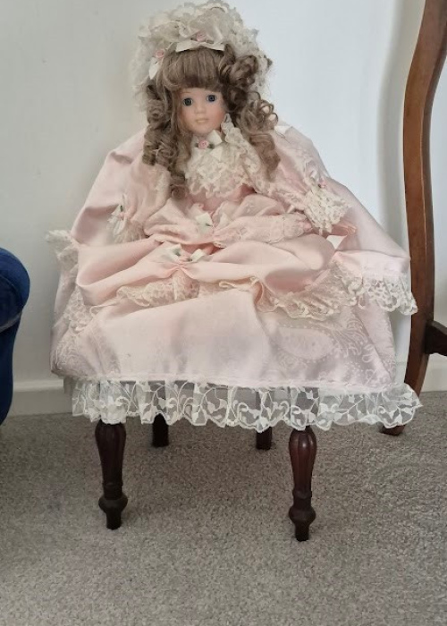 Doll in pink dress